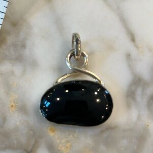 Black and silver pendant